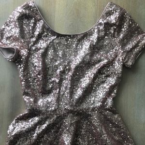 Gold sequence peplum top women’s S, fits like XS